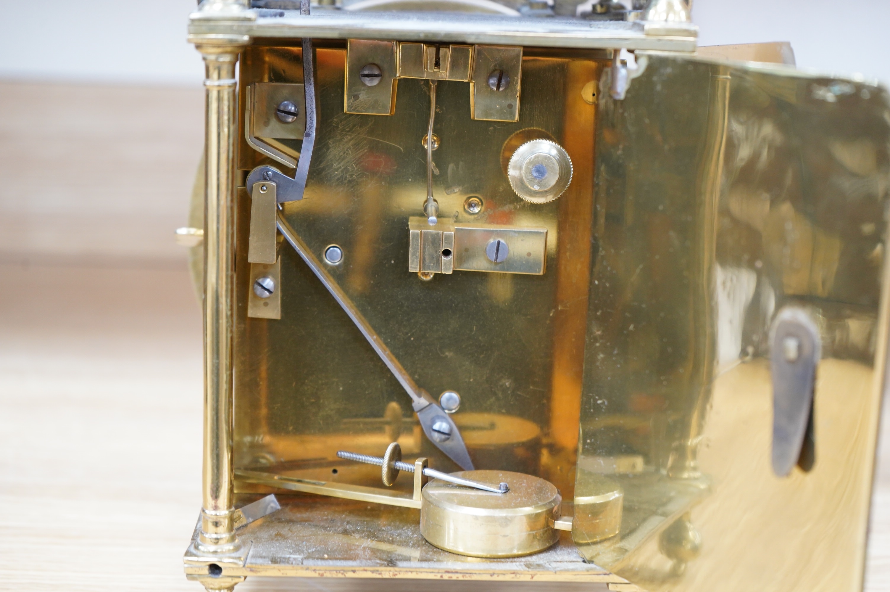 Manner of Richard Rayment of Bury. A Victorian 17th century style lantern clock, in traditional brass case with silvered Roman dial and eight day single fusee movement striking on a bell, 17cm wide, 14.5cm deep, 38cm hig